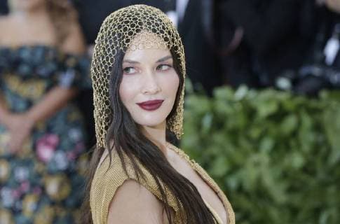 Olivia Munn arrives on the red carpet at The Metropolitan Museum of Art s Costume Institute Benefit Heavenly Bodies: Fashion and the Catholic Imagination at Metropolitan Museum of Art in New York City on May 7, 2018.  NYP20180507822 JOHNxANGELILLO