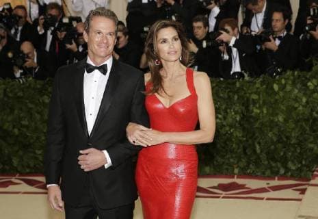Cindy Crawford and Rande Gerber arrive on the red carpet at The Metropolitan Museum of Art s Costume Institute Benefit Heavenly Bodies: Fashion and the Catholic Imagination at Metropolitan Museum of Art in New York City on May 7, 2018.  NYP20180507703 JOHNxANGELILLO