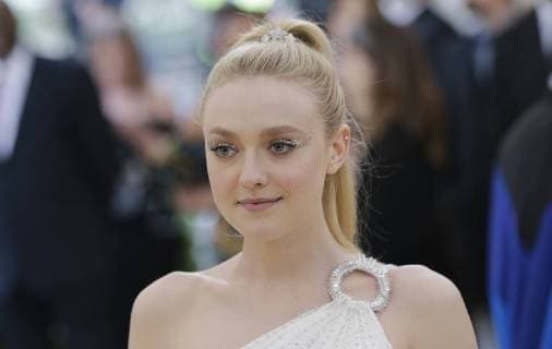 Dakota Fanning arrives on the red carpet at The Metropolitan Museum of Art s Costume Institute Benefit Heavenly Bodies: Fashion and the Catholic Imagination at Metropolitan Museum of Art in New York City on May 7, 2018.  NYP20180507812 JOHNxANGELILLO