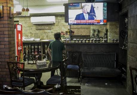 (180508) -- TEHRAN, May 8, 2018 -- A man watches the news broadcast on U.S. withdrawal from the Iran nuclear deal at a teahouse in central Tehran, capital of Iran, on May 8, 2018. U.S. President Donald Trump said on Tuesday that he will withdraw the United States from the Iran nuclear deal, a landmark international agreement signed in 2015. Ahmad Halabisaz) IRAN-TEHRAN-U.S.-TRUMP-IRAN NUCLEAR DEAL-WITHDRAWAL AhmadxHalabsiaz 
