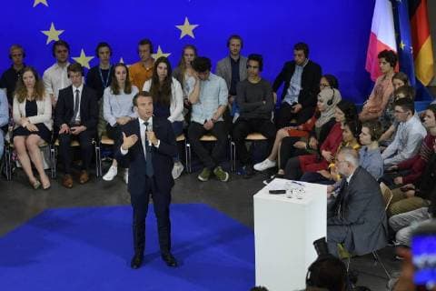 Presentation of the Charlemagne Prize 2018 to Emmanuel Macron The picture shows the French President Emmanuel Macron in the auditorium building C A R L The RWTH in discussion with students who ask him about topics about Europe 2018 Awarding of the Karlspreis 2018 to Emmanuel Macron