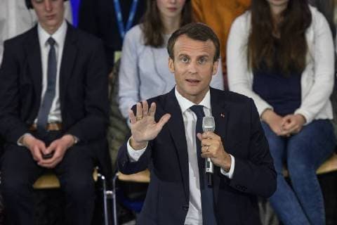 Presentation of the Charlemagne Prize 2018 to Emmanuel Macron The picture shows the French President Emmanuel Macron in the auditorium building C A R L The RWTH in discussion with students who ask him about topics about Europe 2018 Awarding of the Karlspreis 2018 to Emmanuel Macron