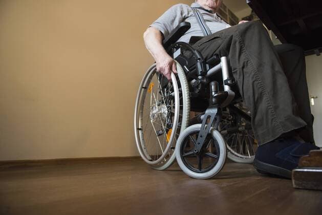 Close-up of a senior man in wheelchair, Altoetting, Bavaria, Germany, Europe mit_2032_11227