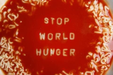 tomato soup with message tomato soup with noodle letters message stop world hunger