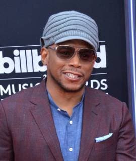 Rapper Sway Calloway arrives for the 2018 Billboard Music Awards at MGM Grand Garden Arena on May 20, 2018 in Las Vegas, Nevada.  LAV20180520122 JIMxRUYMEN