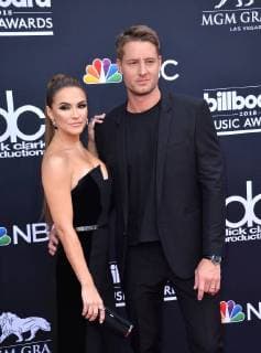 Actors Chrishell Hartley (L) and Justin Hartley arrive for the 2018 Billboard Music Awards at MGM Grand Garden Arena on May 20, 2018 in Las Vegas, Nevada.  LAV20180520177 JIMxRUYMEN