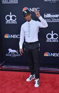 Recording artist T.I. arrives for the 2018 Billboard Music Awards at MGM Grand Garden Arena on May 20, 2018 in Las Vegas, Nevada.  LAV20180520273 JIMxRUYMEN