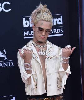 Recording artist Lil Pump arrives for the 2018 Billboard Music Awards at MGM Grand Garden Arena on May 20, 2018 in Las Vegas, Nevada.  LAV20180520289 JIMxRUYMEN