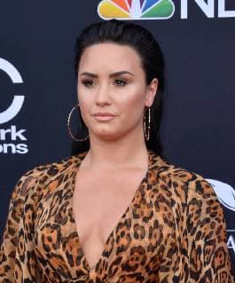 Recording artist Demi Lovato arrives for the 2018 Billboard Music Awards at MGM Grand Garden Arena on May 20, 2018 in Las Vegas, Nevada.  LAV20180520311 JIMxRUYMEN