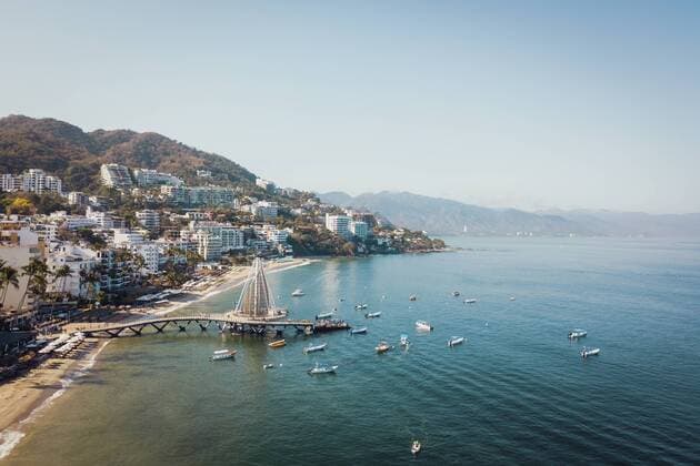 Mexico, Jalisco, Aerial view of Playa Los Muertos, beach and pier in Puerto Vallarta  ABAF02208