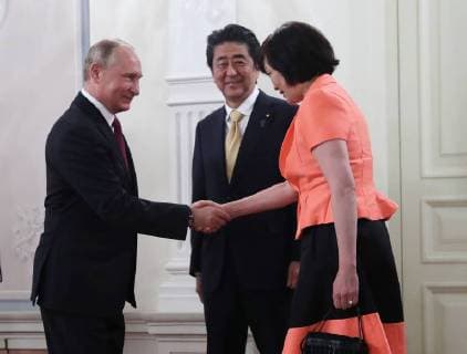 MOSCOW, RUSSIA â€“ MAY 26, 2018: Russia s President Vladimir Putin, Japan s Prime Minister Shinzo Abe and his wife Akie (L-R) at a concert marking the start of the Russia-Japan Year of Culture at the Bolshoi Theatre. Sergei Savostyanov TASS  TS0817BD