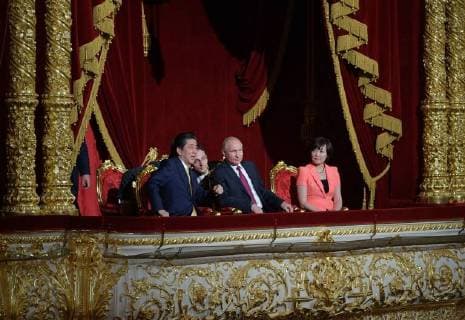 MOSCOW, RUSSIA â€“ MAY 26, 2018: Russia s President Vladimir Putin (C), Japan s Prime Minister Shinzo Abe (L) and his wife Akie (R) watch a concert marking the start of the Russia-Japan Year of Culture at the Bolshoi Theatre. Alexei Druzhinin Russian Presidential Press and Information Office TASS  TS0817E2