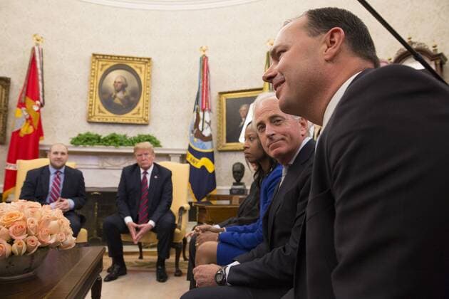 United States President Donald J. Trump and Joshua Holt (seated left), Representative Mia Love (R-UT), Senator Bob Corker(R-TN) listen to Senator Mike Lee (R-UT) speak about the return of Holt to the U.S. at The White House in Washington, DC, May 26, 2018. Holt was released from prison in Venezuela following diplomat efforts by the Obama and Trump administrations.  WAX20180526222 CHRISxKLEPONIS