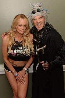 MIAMI BEACH, FL - MAY 26: Stormy Daniels and Granny 4 Barrel pose during a photo session in a Miami Beach studio, Stormy Daniels directed the music video She Likes Guns for music artist Granny 4 Barrel which was just released last month on May 26, 2018 in Miami Beach, Florida. Copyright: xmpi04x