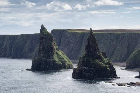 Rugged coastal landscape with the pinnacles Duncansby Stacks coast of Duncansby Head County Caithness Scotland UK Europe Copyright: imageBROKER/MarkusxKeller ibxmkl04608983.jpg