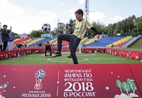 MOSCOW, RUSSIA - JUNE 1, 2018: A boy kicks a Telstar 18 ball during the City of Champions event marking the 2018 FIFA World Cup at the Moscow Palace of Pioneers on International Children s Day. Mikhail Tereshchenko TASS  TS082268