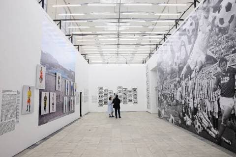 MOSCOW, RUSSIA - JUNE 1, 2018: People view an exhibition on the 1897-2018 history of Russian football at the VDNKh exhibition centre. The exhibition covers the history of Russian and Soviet football from the first football team in the Russian Empire (1897) up to the present times. Alexander Shcherbak TASS  TS0822BB