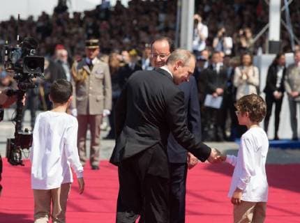 - OUISTREHAM, FRANCE: French President Francois Hollande and Russia s Prime Minister Vladimir Putin pictured at a ceremony as part of the events marking the 70th anniversary of the World War II Allied landings in Normandy in June 1944, in Ouistreham, France, Friday 06 June 2014. POOLxALAINxROLLAND  x58956880x