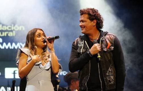 Colombian singer Carlos Vives (R) sings with winner of the Carlos Vives grant, Nicolle Horbath (L), in Bogota, Colombia, 05 June 2018. The Latin Grammy Cultural Foundation granted the Carlos Vives grant for new talents to young Nicolle Horbath, who will study composition at Berklee. Young Colombian singer receives Carlos Vives grant !ACHTUNG: NUR REDAKTIONELLE NUTZUNG!  Copyright: xMauricioxDuenasxCastanedax BOG01 20180605-636638273933321759