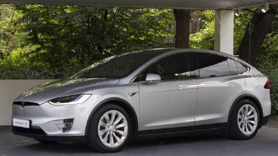 Italy: Parco Valentino car show opens in Torino Tesla Model X. 2018 edition of Parco Valentino car show hosts cars by many automobile manufacturers and car designers inside Valentino Park in Torino, Italy. Turin Italy  MarcoxDestefanis