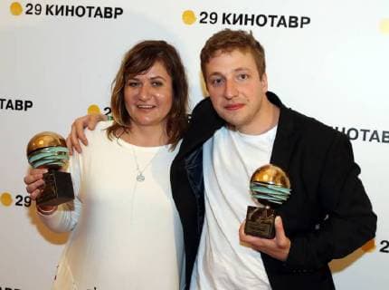 SOCHI, RUSSIA - JUNE 10, 2018: Director Natalia Meshchaninova (L), the winner of the Kinotavr Main Prize, and actor Stepan Devonin, the winner of the Best Actor award, both for the film Core of the World, at the closing ceremony of the 29th Kinotavr Film Festival. Vyacheslav Prokofyev TASS  TS0836BD