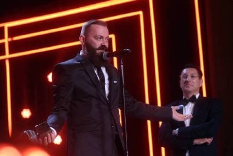 SOCHI, RUSSIA - JUNE 10, 2018: Director Grigory Konstantinopolsky (L), the winner of the Best Direction award for his film Russian Psycho, at the closing ceremony of the 29th Kinotavr Film Festival. Vyacheslav Prokofyev TASS  TS0836DF