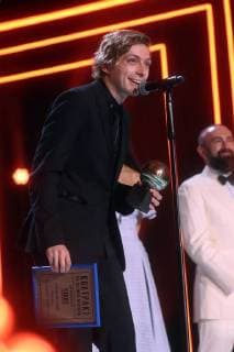 SOCHI, RUSSIA - JUNE 10, 2018: Director Alexander Gorchilin, the winner of the Best Debut award the film Acid, at the closing ceremony of the 29th Kinotavr Film Festival. Vyacheslav Prokofyev TASS  TS0836EC