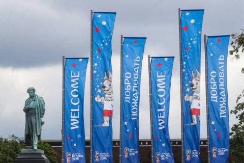 MOSCOW, RUSSIA - JUNE 13, 2018: 2018 FIFA World Cup flags on the eve of the 2018 FIFA World Cup in Pushkinskaya Square. Vyacheslav Prokofyev TASS  TS083DB6