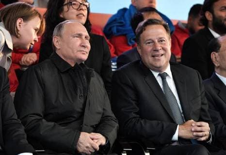 MOSCOW, RUSSIA â€“ JUNE 13, 2018: Russia s President Vladimir Putin (L) and Panama s President Juan Carlos Varela watch a concert by opera stars ahead of the 2018 FIFA World Cup, at Moscow s Red Square. Alexei Nikolsky Russian Presidential Press and Information Office TASS  TS083F4B