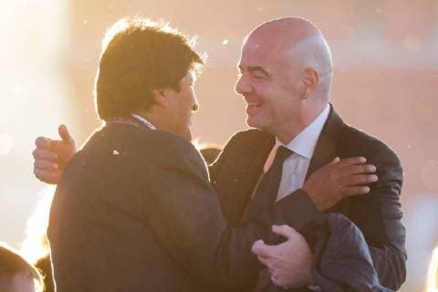 MOSCOW, RUSSIA â€“ JUNE 13, 2018: Bolivia s President Evo Morales (L) and FIFA President Gianni Infantino talking ahead of a concert by opera stars ahead of the 2018 FIFA World Cup, at Moscow s Red Square. Mikhail Metzel TASS  TS083F71