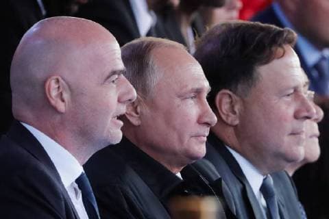 MOSCOW, RUSSIA â€“ JUNE 13, 2018: FIFA President Gianni Infantino, Russia s President Vladimir Putin, and Panama s President Juan Carlos Varela (L-R) watch a concert by opera stars ahead of the 2018 FIFA World Cup, at Moscow s Red Square. Mikhail Metzel TASS  TS083F72