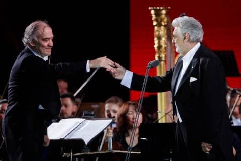 MOSCOW, RUSSIA â€“ JUNE 13, 2018: Mariinsky Theatre artistic director, conductor Valery Gergiev (L) and Spanish tenor Placido Domingo perform during concert by opera stars ahead of the 2018 FIFA World Cup, at Moscow s Red Square. Mikhail Metzel TASS  TS083FDB
