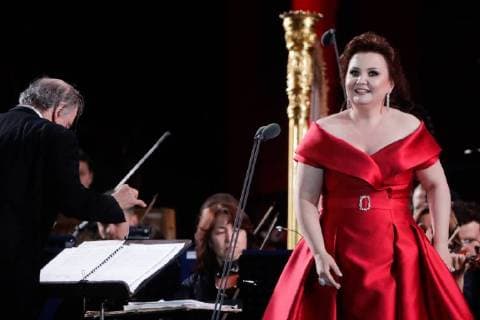 MOSCOW, RUSSIA â€“ JUNE 13, 2018: Mariinsky Theatre artistic director, conductor Valery Gergiev (L) and Russian soprano Albina Shagimuratova perform during concert by opera stars ahead of the 2018 FIFA World Cup, at Moscow s Red Square. Mikhail Metzel TASS  TS083FDD