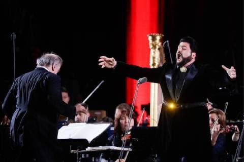 MOSCOW, RUSSIA â€“ JUNE 13, 2018: Mariinsky Theatre artistic director, conductor Valery Gergiev (L) and Azerbaijani tenor Yusif Eyvazov perform during concert by opera stars ahead of the 2018 FIFA World Cup, at Moscow s Red Square. Mikhail Metzel TASS  TS083FE2