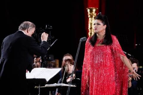 MOSCOW, RUSSIA â€“ JUNE 13, 2018: Mariinsky Theatre artistic director, conductor Valery Gergiev (L) and Russian soprano Anna Netrebko perform during concert by opera stars ahead of the 2018 FIFA World Cup, at Moscow s Red Square. Mikhail Metzel TASS  TS083FE5
