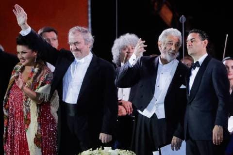 MOSCOW, RUSSIA â€“ JUNE 13, 2018: Russian soprano Anna Netrebko, Mariinsky Theatre artistic director, conductor Valery Gergiev, Spanish tenor Placido Domingo, and Peruvian tenor Juan Diego Florez (L-R front) perform during concert by opera stars ahead of the 2018 FIFA World Cup, at Moscow s Red Square. Mikhail Metzel TASS  TS083FE9