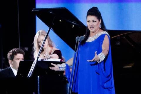 MOSCOW, RUSSIA â€“ JUNE 13, 2018: Russian pianist Denis Matsuev (L) and Russian soprano Anna Netrebko perform during concert by opera stars ahead of the 2018 FIFA World Cup, at Moscow s Red Square. Mikhail Metzel TASS  TS083FED