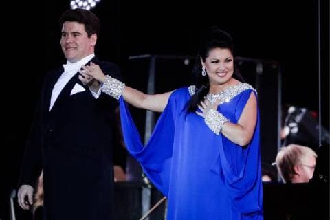 MOSCOW, RUSSIA â€“ JUNE 13, 2018: Russian pianist Denis Matsuev (L) and Russian soprano Anna Netrebko perform during concert by opera stars ahead of the 2018 FIFA World Cup, at Moscow s Red Square. Mikhail Metzel TASS  TS083FEF