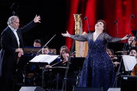 MOSCOW, RUSSIA â€“ JUNE 13, 2018: Mariinsky Theatre artistic director, conductor Valery Gergiev (L) and Russian soprano Albina Shagimuratova perform during a concert by opera stars ahead of the 2018 FIFA World Cup, at Moscow s Red Square. Mikhail Metzel TASS  TS083FF7
