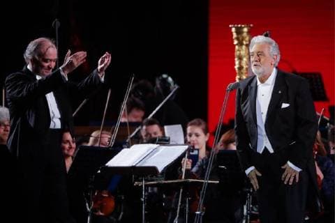 MOSCOW, RUSSIA â€“ JUNE 13, 2018: Mariinsky Theatre artistic director, conductor Valery Gergiev (L) and Spanish tenor Placido Domingo perform during a concert by opera stars ahead of the 2018 FIFA World Cup, at Moscow s Red Square. Mikhail Metzel TASS  TS083FF9