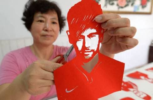 Paper-cutting of football stars mark World Cup 2018 The folk artist Feng Shiping makes paper-cutting works of football stars including Lionel Messi, Neymar da Silva Santos Junior, Thomas Muller, Luis Suarez and Cristiano Ronaldo in Handan, north China s Hebei Province, marking the upcoming World Cup 2018. CHINA OUT Handan Handan China  HaoxQunying