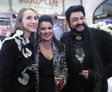 MOSCOW, RUSSIA - JUNE 13, 2018: Ballet dancer Svetlana Zakharova, Russian soprano Anna Netrebko and Azerbaijani tenor Yusif Eyvazov (L-R) attend a party after a concert by opera stars ahead of the 2018 FIFA World Cup, at the GUM Department Store. Mikhail Metzel TASS  TS08400A