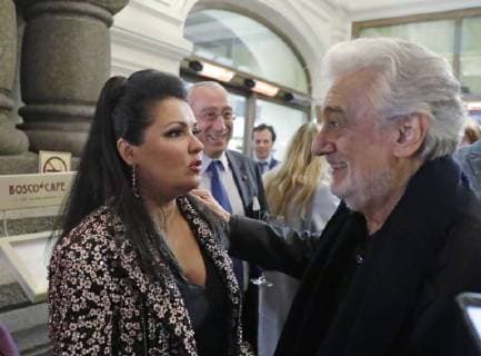 MOSCOW, RUSSIA - JUNE 13, 2018: Russian soprano Anna Netrebko (L) and Spanish tenor Placido Domingo attend a party after a concert by opera stars ahead of the 2018 FIFA World Cup, at the GUM Department Store. Mikhail Metzel TASS  TS084010