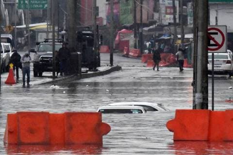 June 14, 2018 - EUM20180614ACT04.JPG.CIUDAD DE MEXICO.- RainsLluvias-CDMX.- 14 de junio 2018. Por segundo dia consecutivo se registraron fuertes lluvias en la Ciudad de Mexico, ahora provocando afectaciones en el oriente, lo que causo la suspension del servicio de algunas estaciones de la Linea A del Sistema de Transporte Colectivo (STC) Metro. En algunas zonas el agua cubrio a los automoviles. Foto: Agencia EL UNIVERSALAlan RodriguezRCC.  - ZUMAu78_ 20180614_zaf_u78_625 Copyright: xElxUniversalx