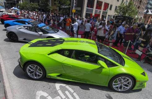 (180618) -- TORONTO, June 18, 2018 -- People visit the 2018 Yorkville Exotic Car Show on Bloor Street in Toronto, Canada, June 17, 2018. With over 110 classic and exotic cars, this annual event kicked off on Sunday. )(gj) CANADA-TORONTO-EXOTIC CAR SHOW ZouxZheng 