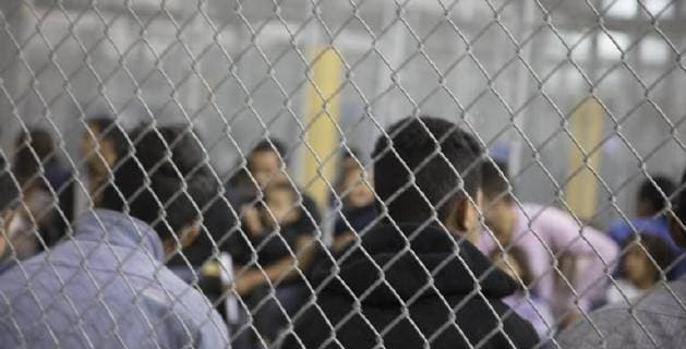 June 18, 2018 - McAllen, Texas, U.S. - In this photo provided by on, people who ve been taken into custody related to cases of illegal entry into the United States, sit in one of the cages at a facility in McAllen, Texas, Sunday, June 17, 2018. McAllen US  - ZUMA 20180618_jlr_z03_008 Copyright: xU.S.xCustomsxandxBorderxProtectix