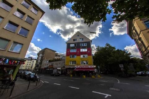A giant Germany flag with a size of about 100 square meters hangs on the occasion of the Football World Cup 2018 in Russia on a house facade in Cologne Huge Germany flag