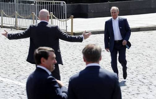 MOSCOW, RUSSIA - JUNE 28, 2018: FIFA President Gianni Infantino (L back) and Russia s President Vladimir Putin (R back) visit the 2018 FIFA World Cup Football Park in Red Square. Mikhail Metzel TASS  TS086D45