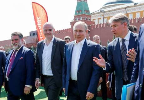 MOSCOW, RUSSIA - JUNE 28, 2018: The Chairman of the Supervisory Board of Bosco di Ciliegi Group Mikhail Kusnirovich (L), FIFA President Gianni Infantino (2nd L), Russia s President Vladimir Putin (2nd R), and the Chairman and CEO of the 2018 FIFA World Cup Russia Local Organising Committee (LOC), Alexei Sorokin (R) visit the 2018 FIFA World Cup Football Park in Red Square. Mikhail Metzel TASS  TS086D5A
