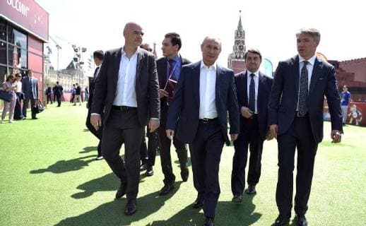June 28, 2018. - Russia, Moscow. - Russian President Vladimir Putin and FIFA President Gianni Infantino (left) visit the themed 2018 FIFA World Cup Football Park on Red Square. Right: CEO of the Russia 2018 Local Organizing Committee Aleksey Sorokin. KremlinxPool 